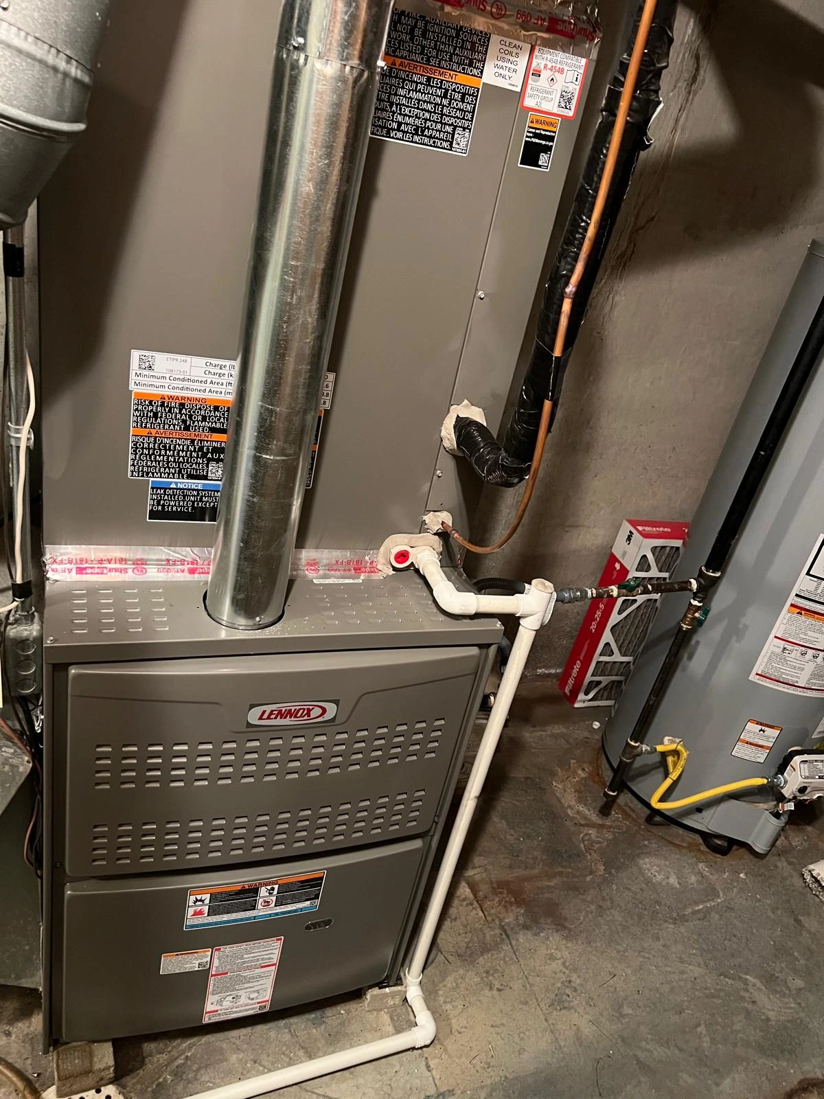 Lennox multi-stage gas furnace system setup in basement
